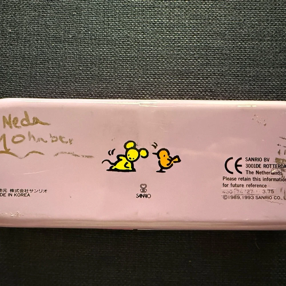 Sanrio Pochacco Pink Tin Pencil Box with Colorful Lettering